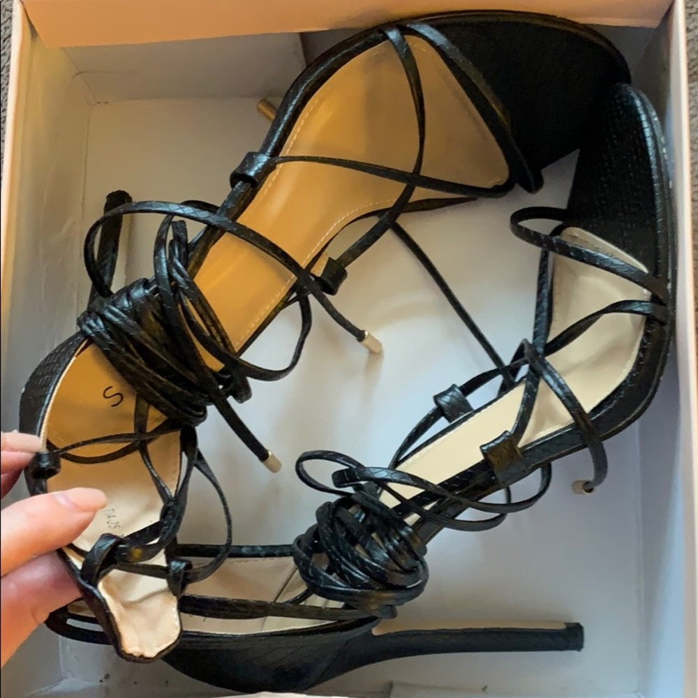 Strappy snakeskin heels